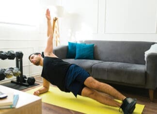 Strong Core / Sexy Abs Fitness young man training at his home gym