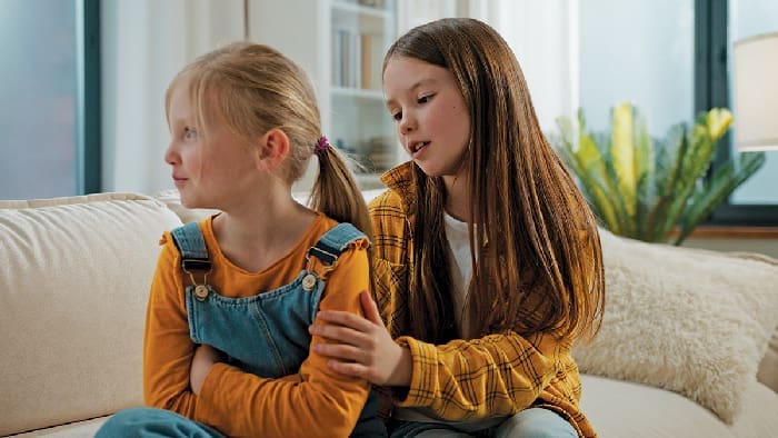 Girls apologize iStock 2258899079 Girls apologize iStock 2258899079