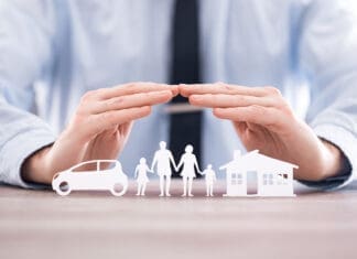 Covering Your Assets Insurance protecting family health live, house and car concept.